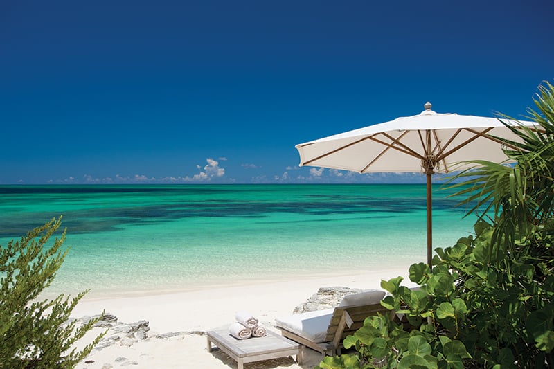 Beachfront villas at Como Parrot Cay